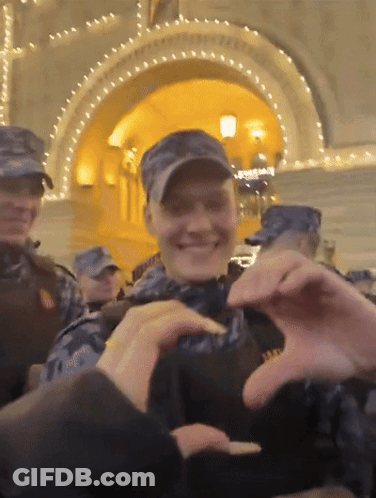 People Making Heart Shape With Hands GIF