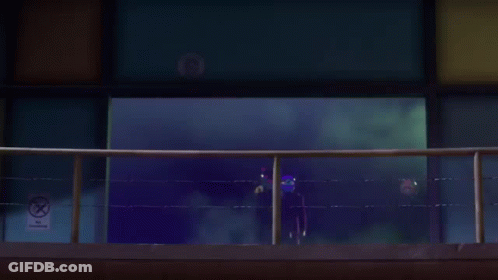 People On Balcony Wearing Masks Including Ox GIF
