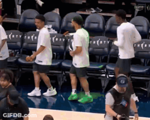 People On Basketball Court With Thirty Chairs GIF