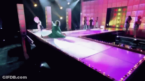 People On Stage With Purple Lights GIF