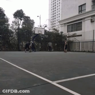 People Playing Basketball Near Building GIF