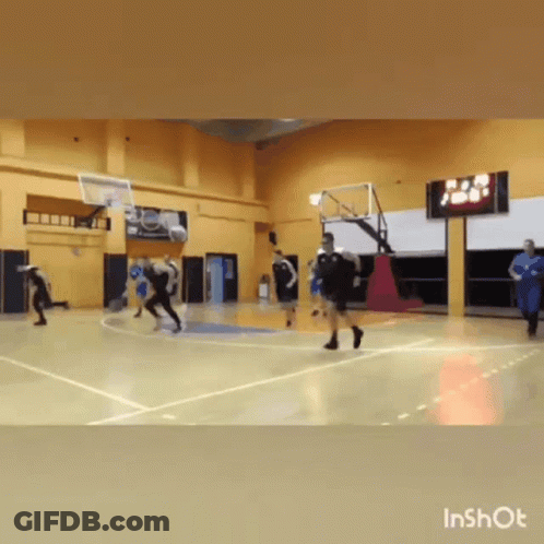 People Playing Basketball On Court With Scoreboard GIF