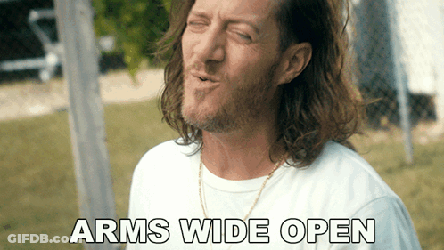 People Playing In Pool With Woman On Man's Shoulders GIF