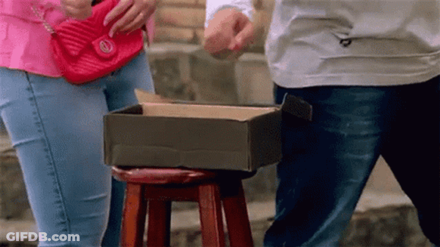 People Putting Donation In Box GIF