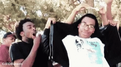 People Riding Roller Coaster One With Glasses GIF