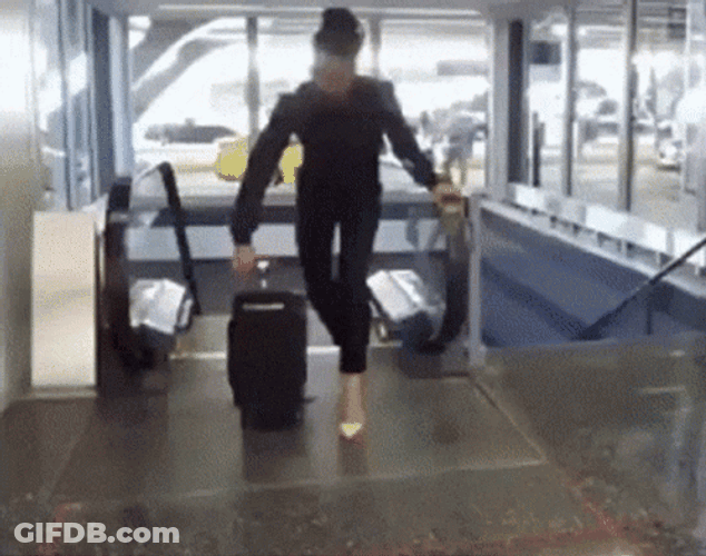 People Riding Their Luggage In Airport GIF