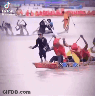 People Rowing Boats On A Lake GIF