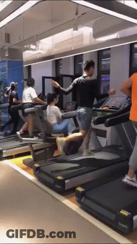 People Running On Treadmills In Gym GIF