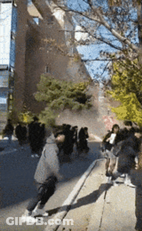 People Running Outside Earthquake GIF