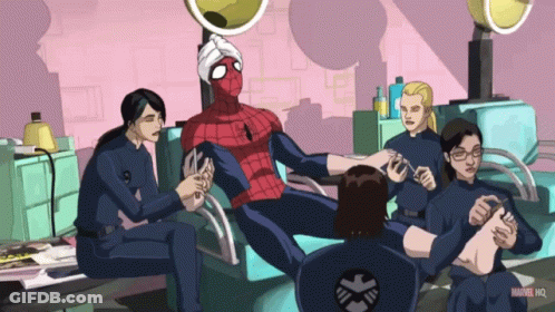 People Sitting Around Man In Spider-Man Costume GIF