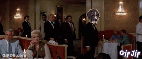 People Sitting At Restaurant Tables GIF