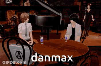 People Sitting At Table With Danmax GIF