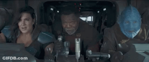 People Sitting In Car With Blue Mask GIF