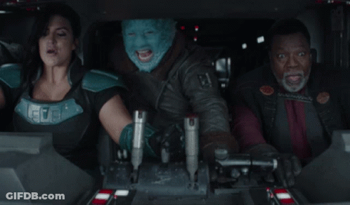 People Sitting In Car With Blue Mask GIF
