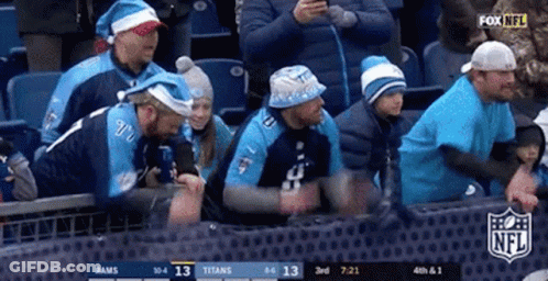 People Sitting In Stadium Watching Game GIF