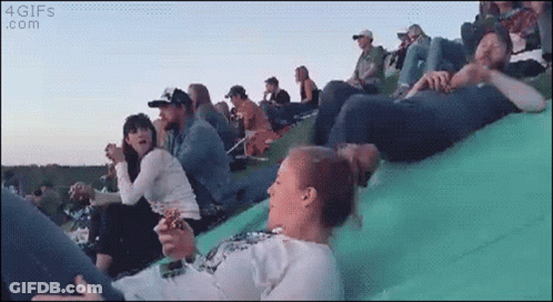 People Sitting On Green Slide 4Gifs.com GIF