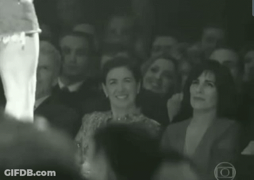 People Smiling In Dark Room GIF