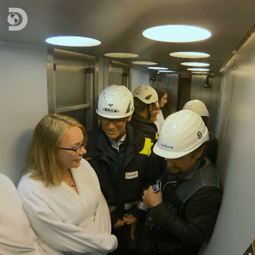 People Squeezing In Small Room GIF