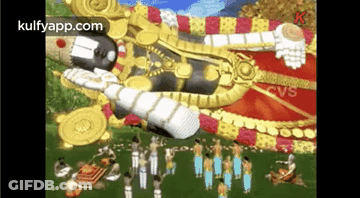 People Standing Around Deity Statue GIF