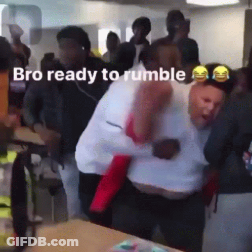 People Standing Around Table Bro Ready To Rumble GIF