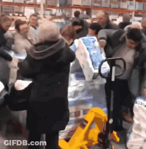 People Standing Around Yellow Pallet Truck GIF