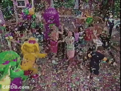 People Standing In Confetti Room GIF