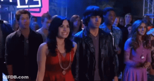 People Standing In Crowd At Party GIF