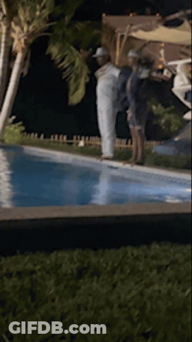 People Standing Next To Pool GIF