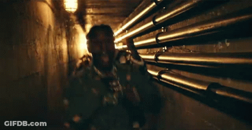 People Standing Together In Dark Room GIF