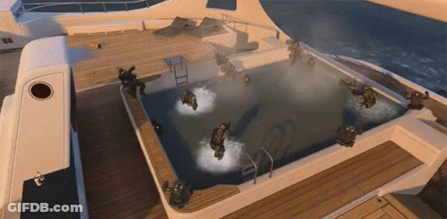 People Swimming In Large Pool GIF