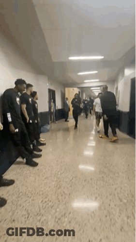 People Talking In Hallway GIF