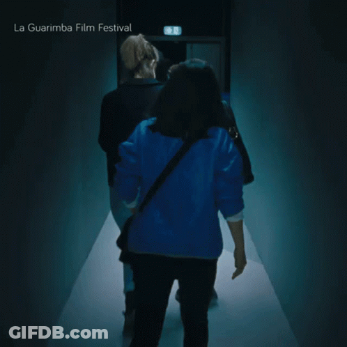 People Walking Down Hallway La Guarimba Film Festival GIF