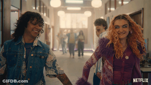 People Walking Down Hallway With Netflix GIF