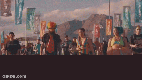 People Walking Down Mountain Street GIF