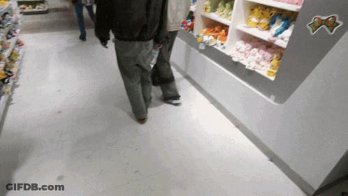 People Walking In Store With Pokemon Sticker GIF