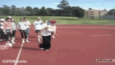 People Walking On Red Track One Jumping GIF
