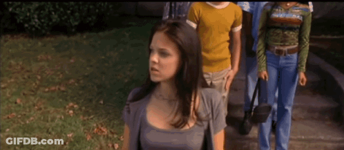 People Walking Sidewalk One Yellow Shirt GIF