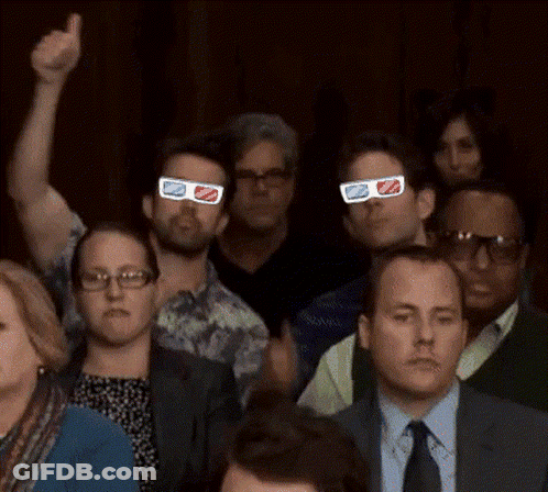 People Wearing 3D Glasses Raising Hands GIF