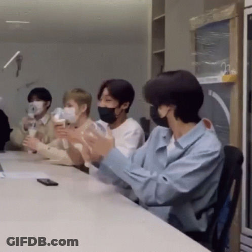 People Wearing Face Masks Clapping GIF