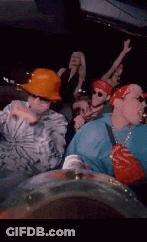People Wearing Hard Hats And Bandanas In Car GIF