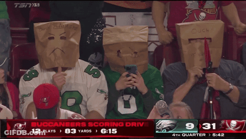 People With Paper Bags Watching Buccaneers Game GIF