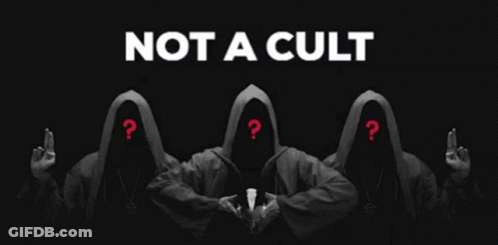 People With Question Marks Standing Before Not A Cult Sign GIF
