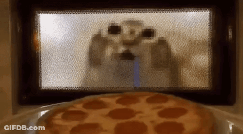 Pepperoni Pizza In Microwave With Cartoon Character GIF
