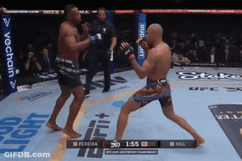 Pereira Fighting Hill In UFC Fight GIF