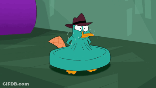 Perry The Platypus Sitting In Chair With Pillow GIF