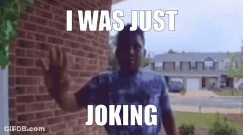 Person At Brick Wall: I Was Just Joking GIF