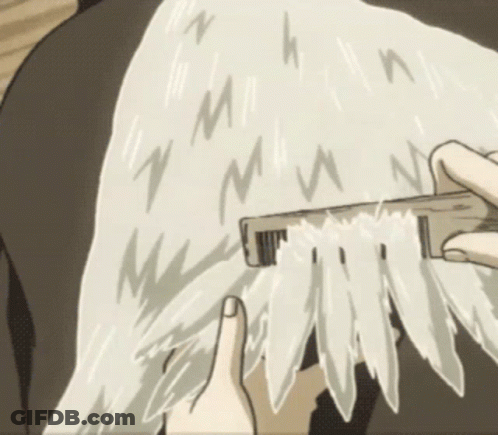 Person Brushing Hair With M Comb GIF