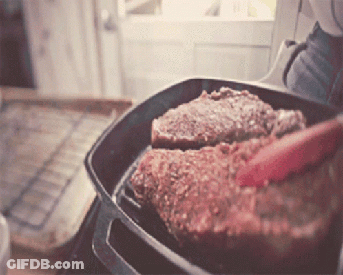 Person Cooking Steak In Pan GIF