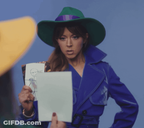 Person Covering Eyes With Flower GIF