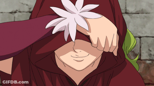 Person Covering Eyes With Flower On Hand GIF